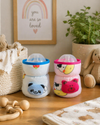 THE LITTLE LOOKERS Soft Plush Stretchable Baby Feeding Bottle Cover with Easy to Hold Strap | Cute Animated Overall Print Pack of 2, Multicolor