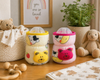 THE LITTLE LOOKERS Soft Plush Stretchable Baby Feeding Bottle Cover with Easy to Hold Strap | Cute Animated Overall Print Pack of 2, Multicolor